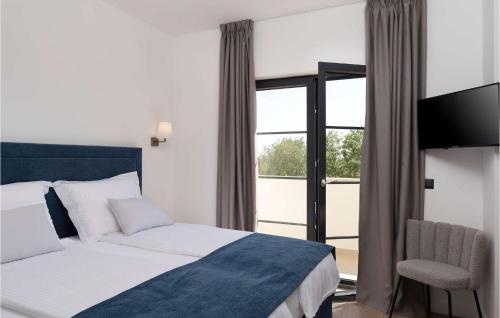 Postel nebo postele na pokoji v ubytování Villa Zrinchi