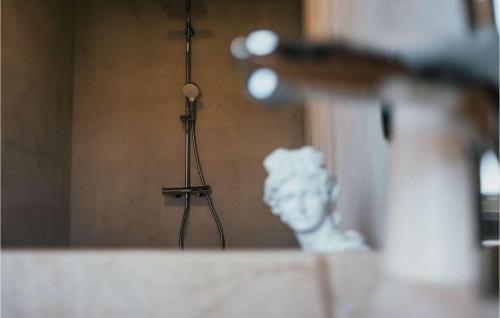 a sculpture of a head in a room at Villa Breakaway in Selca