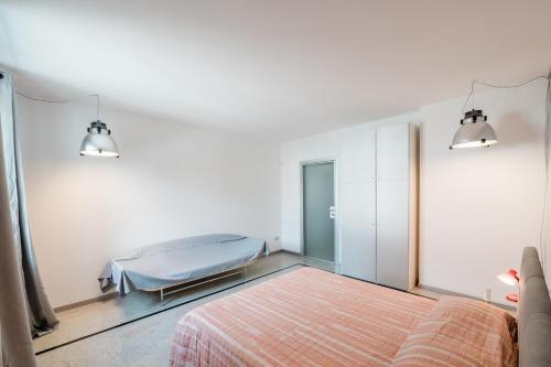 Un pat sau paturi într-o cameră la P&P Luxury Apartment