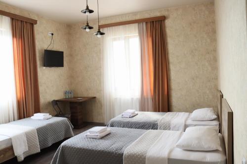Hotel West Faceにあるベッド