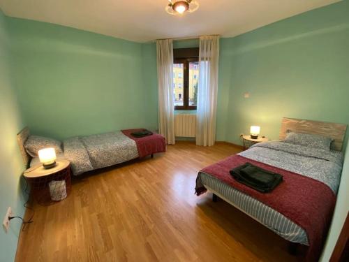 Кровать или кровати в номере Apartment close to the historical center