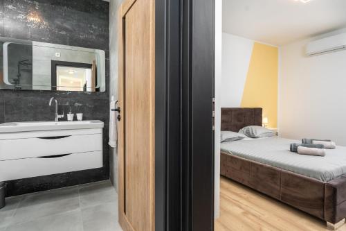 Ένα ή περισσότερα κρεβάτια σε δωμάτιο στο Villa Levak