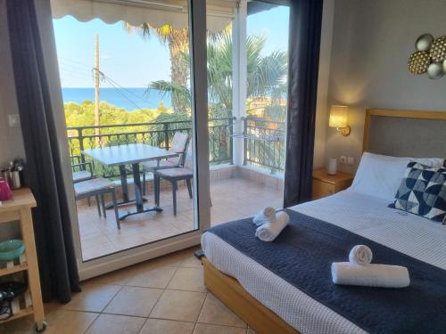 Postel nebo postele na pokoji v ubytování GreenHill Holiday Suites