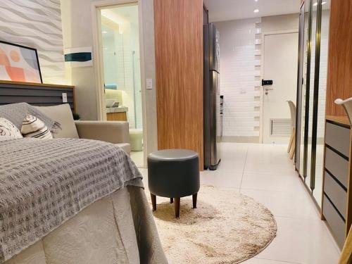 Кровать или кровати в номере FLAT ILHA DO LEITE - DENTRO PÓLO MÉDICO