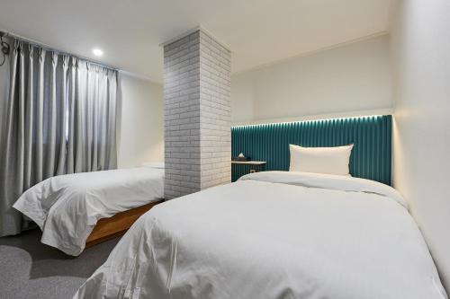 Hotel Chloeにあるベッド