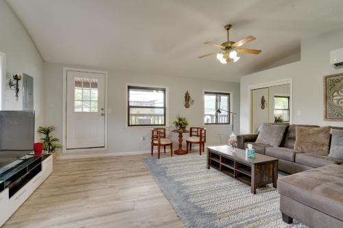 a living room with a couch and a table at Second-Floor Harveys Lake Apartment with Deck! in Harveys Lake