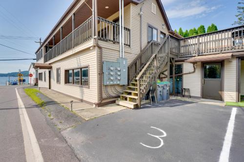a building with a staircase on the side of a street at Second-Floor Harveys Lake Apartment with Deck! in Harveys Lake