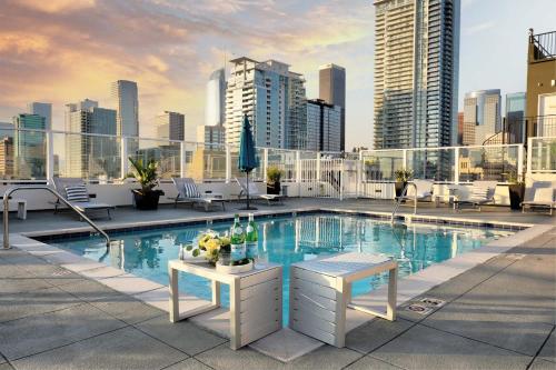 a pool on the roof of a building at NYC Styled Loft In DTLA, sleeps 4 with Free Parking! in Los Angeles