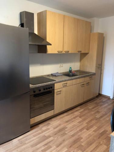 Kuchyň nebo kuchyňský kout v ubytování DKN - Ihr Zuhause auf Zeit in Merseburg Nähe Leuna, Schkopau - Voll ausgestattet