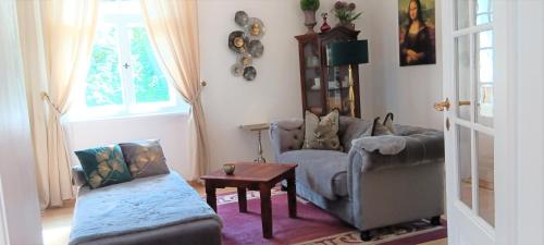Postel nebo postele na pokoji v ubytování VILLA FREIA Dresden - Exklusive Ferienwohnung zum Erholen & Entspannen