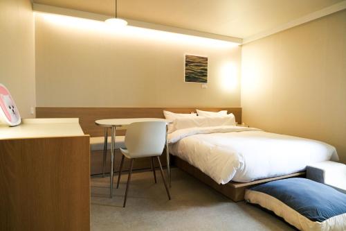Cama o camas de una habitación en Aank Hotel Incheon Songdo