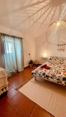 Кровать или кровати в номере Monte do Pópulo