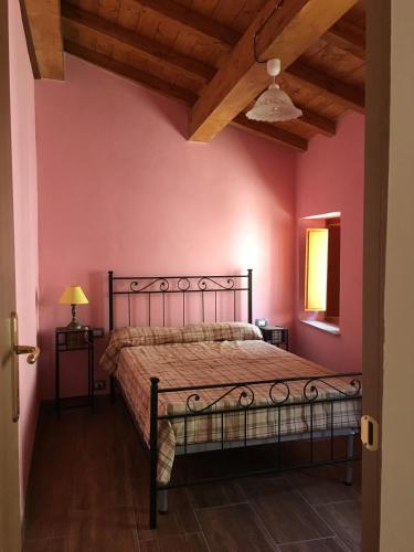 Katil atau katil-katil dalam bilik di Casa in Borgo Antico "Rondine House"