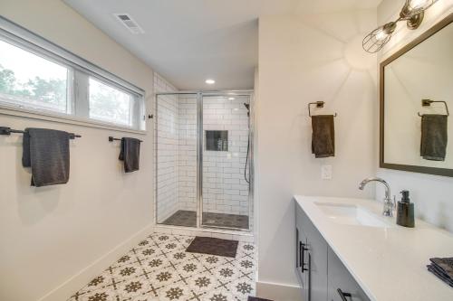 a bathroom with a shower and a sink at Fayetteville Vacation Rental Less Than 1 Mi to Town Center in Fayetteville