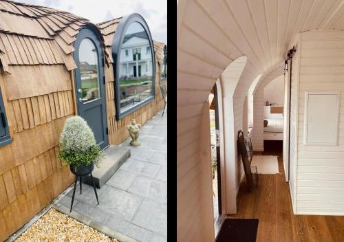 una casa con una entrada arqueada y una casa con un porche en Tirolian Lodge North, Whirlpool, Sauna, Lagerfeuer, en Bundorf