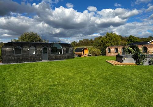 Fotografie z fotogalerie ubytování Tirolian Lodge North, Whirlpool, Sauna, Lagerfeuer v destinaci Bundorf