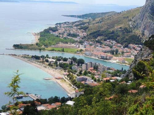 a view of a beach and a city at Villa Maristika in Omiš