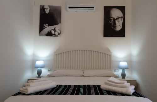 Cama o camas de una habitación en Residenza La Meridiana