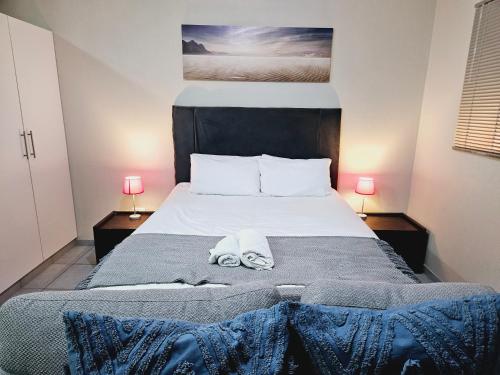Ένα ή περισσότερα κρεβάτια σε δωμάτιο στο Quantum Heights - Studio Apartment - 2 nights minimum booking
