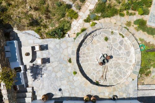 an overhead view of a stone walkway in a park at Sifnos Themonies in Apollonia