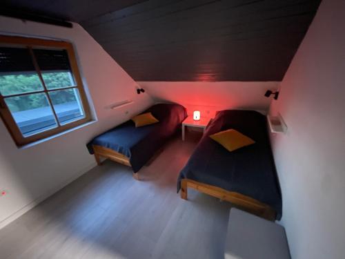 Krevet ili kreveti u jedinici u okviru objekta Nóra Apartman