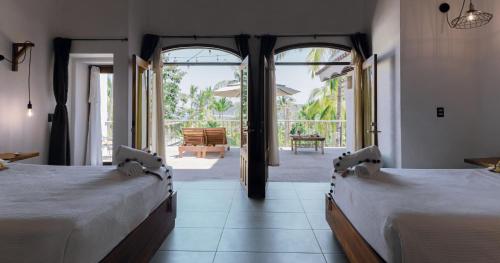 Letto o letti in una camera di DISTRITO 88 - Hotel Boutique Only Adults
