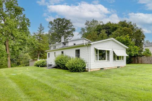 a white house with a yard at Pennington Home with Deck about 9 Mi to Princeton! in Pennington