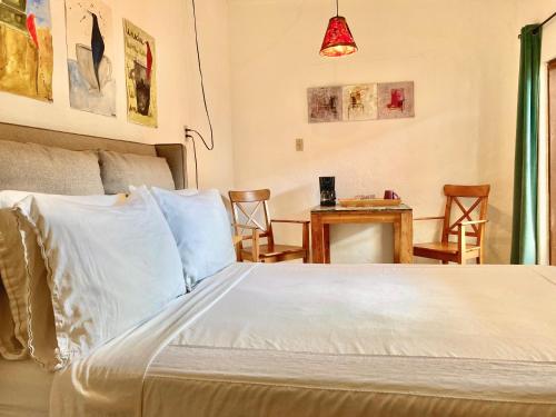 Lova arba lovos apgyvendinimo įstaigoje Habitación #4 a dos cuadras del malecón
