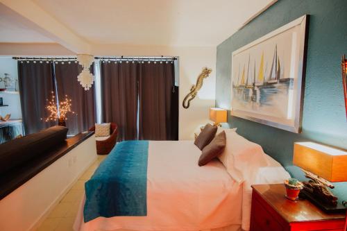 Katil atau katil-katil dalam bilik di Condominio Gaudi