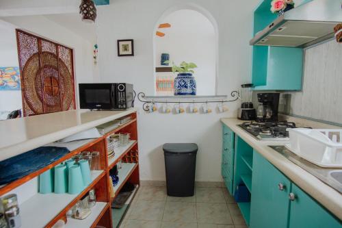 Dapur atau dapur kecil di Condominio Gaudi