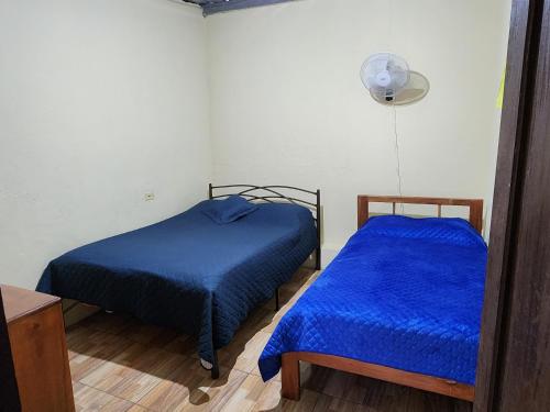 Кровать или кровати в номере Departamento Amoblado Starlink -Pto Ayora
