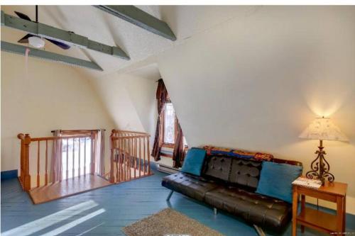 a living room with a couch and a table at 3 Bedroom 2 Bath Carriage House (Pet Friendly) in Bar Harbor