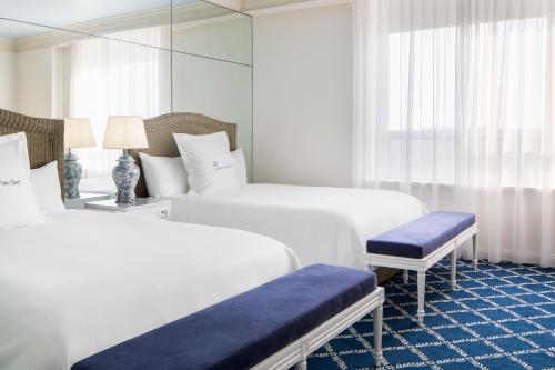 Ένα ή περισσότερα κρεβάτια σε δωμάτιο στο Grand Galvez Resort, Autograph Collection