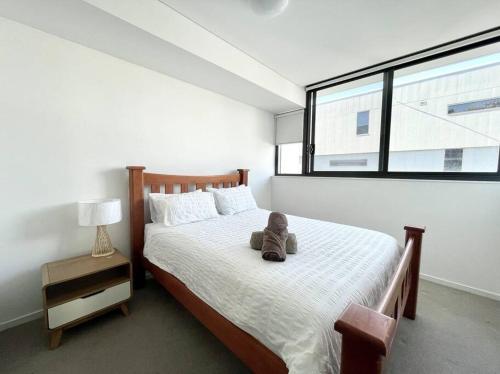 Katil atau katil-katil dalam bilik di SkyPark Oasis Retreat 2Br@ close to Olympicpark
