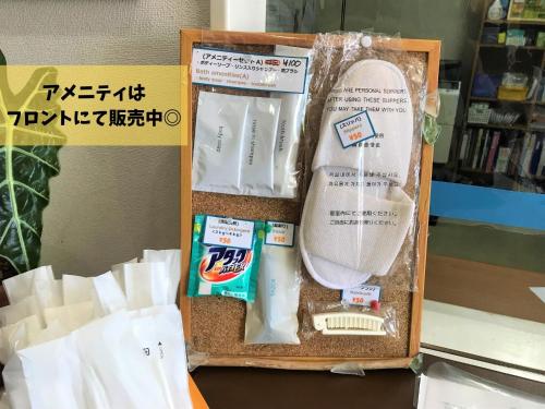 a box with a skateboard and other items in it at Southern Village Okinawa - Vacation STAY 09953v in Kishaba