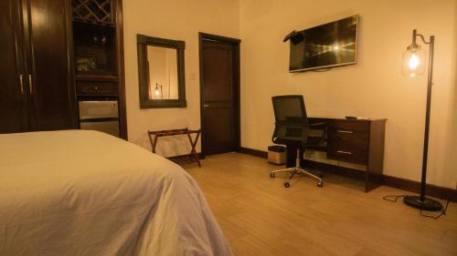TV a/nebo společenská místnost v ubytování Hotel Poza Blanca Lodge