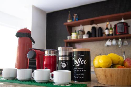 Příslušenství pro přípravu čaje a kávy v ubytování Iduna Hostel
