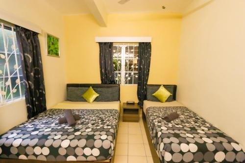 Ένα ή περισσότερα κρεβάτια σε δωμάτιο στο Golden Lodge