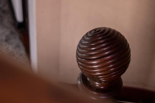a close up of a brown knob on a door at Hotel Casa Colon in San José