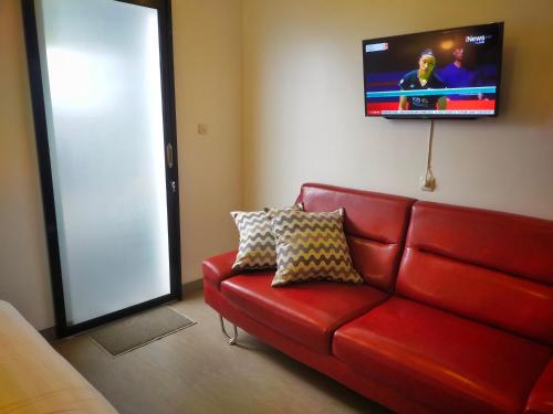 AUREIRIN Guesthouseにあるテレビまたはエンターテインメントセンター
