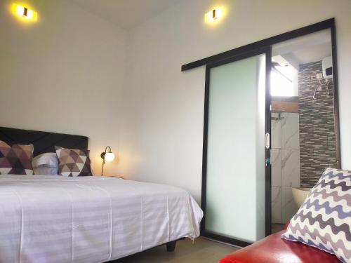 AUREIRIN Guesthouseにあるベッド