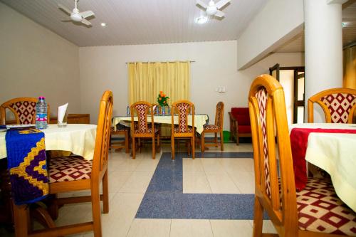 Postel nebo postele na pokoji v ubytování PRESTIGE Guesthouse ,Ksi
