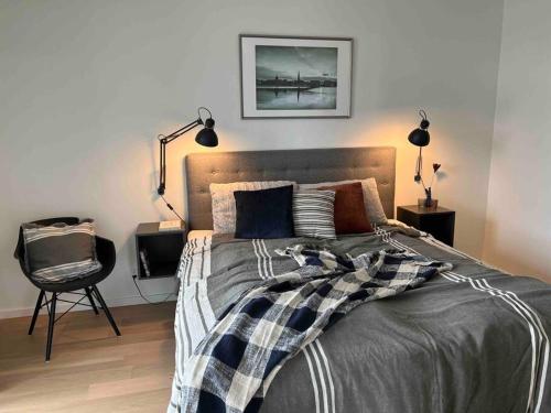 Bo med stil og udsigt til Aarhus lystbådehavn tesisinde bir odada yatak veya yataklar