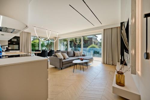 Η κουζίνα ή μικρή κουζίνα στο BlueApart Apartamenty Jurata