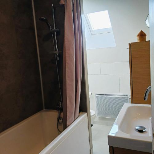 a bathroom with a shower and a sink at o tour de l'eau in Aubevoye