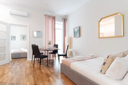Letto o letti in una camera di Art Palace - LoftAffair Collection
