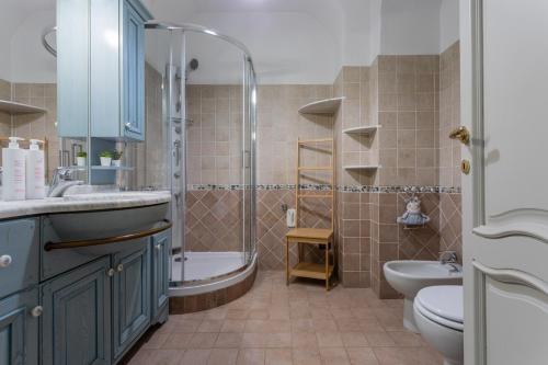 a bathroom with a sink toilet and a shower at Casa Dora by Wonderful Italy in Turin