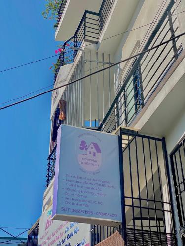 a sign on the side of a building at Homestay Tuyết Trinh in Nha Trang