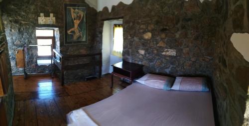 Un pat sau paturi într-o cameră la Ktima Ampela #23#