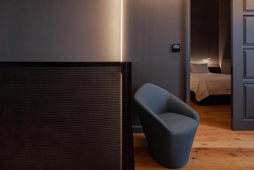 Ένα ή περισσότερα κρεβάτια σε δωμάτιο στο The Sendal Boutique Hotel